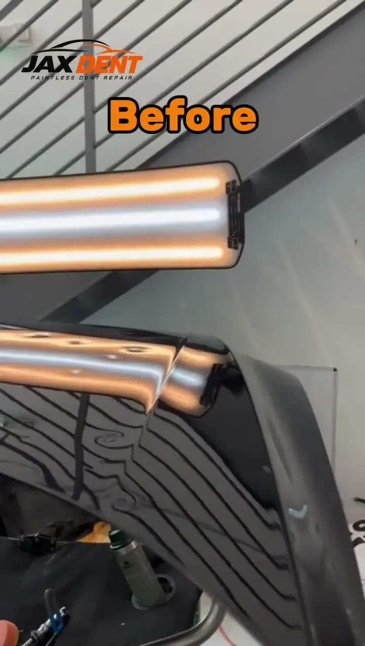 Before-and-after video of several dents removed from a black vehicle panel.